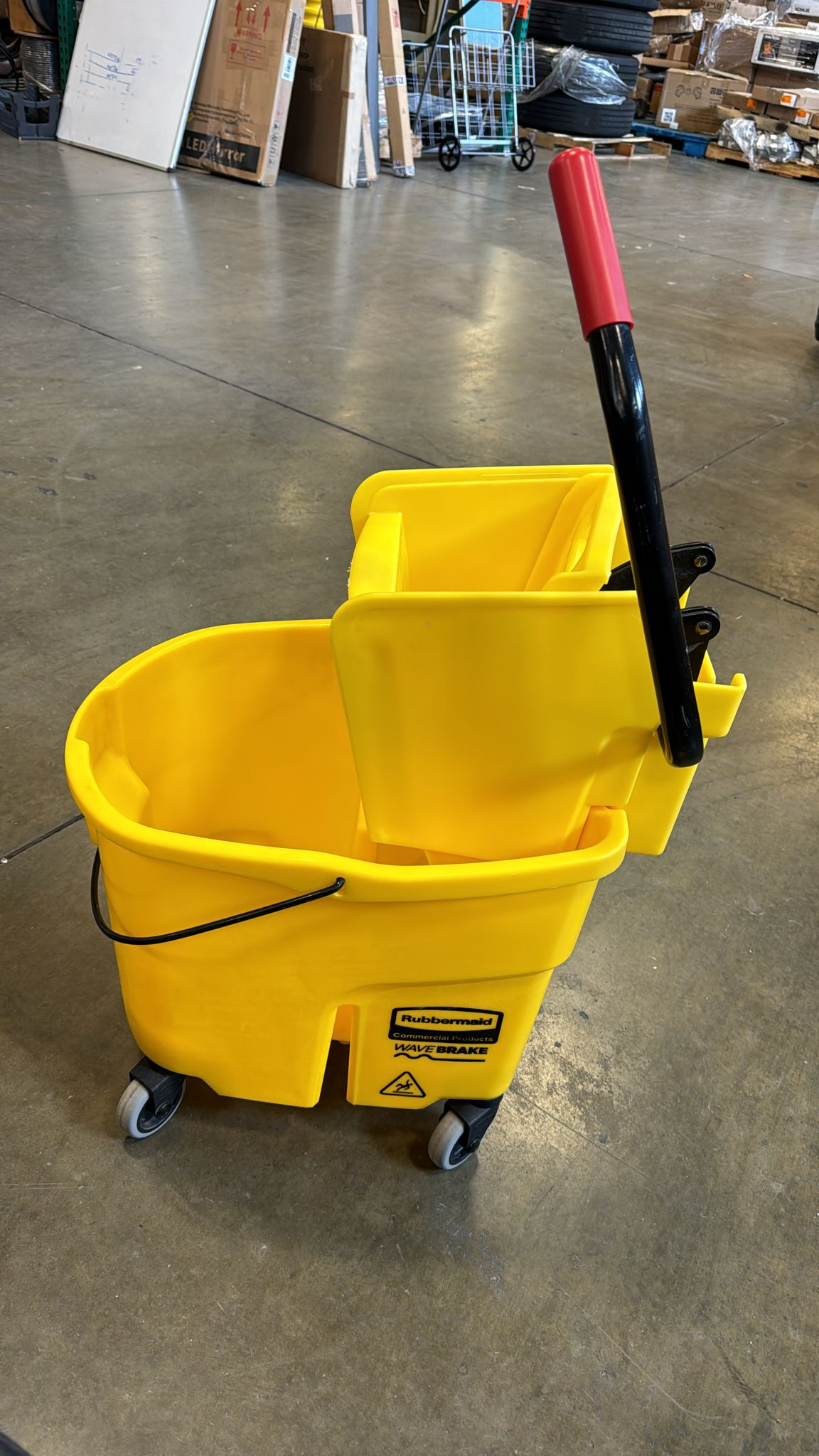 Rubbermaid Commercial WaveBrake 2.0 35 qt. Mop Bucket Yellow