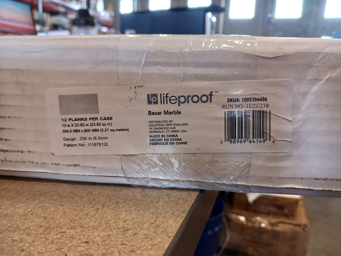 Lifeproof Bexar Marble 12 MIL x 12 in. W x 24 in. L Click Lock Waterproof Vinyl Tile Flooring (23.8 sqft/case)