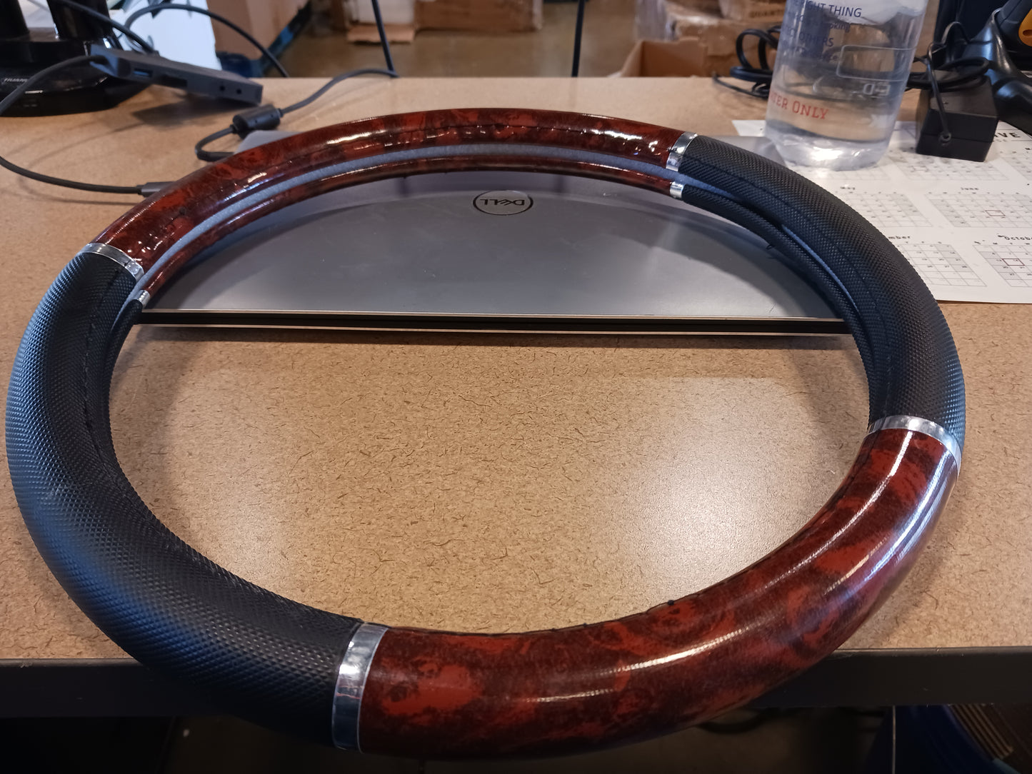 Black Steering Wheel Cover with Woodgrain Design and Chrome Trim