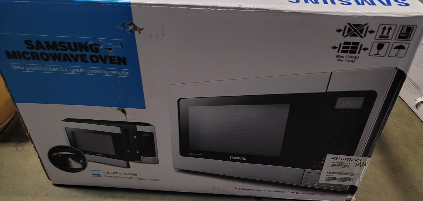 SAMSUNG 1.1 cu. ft Countertop Microwave with Grilling Element in Stainless Steel