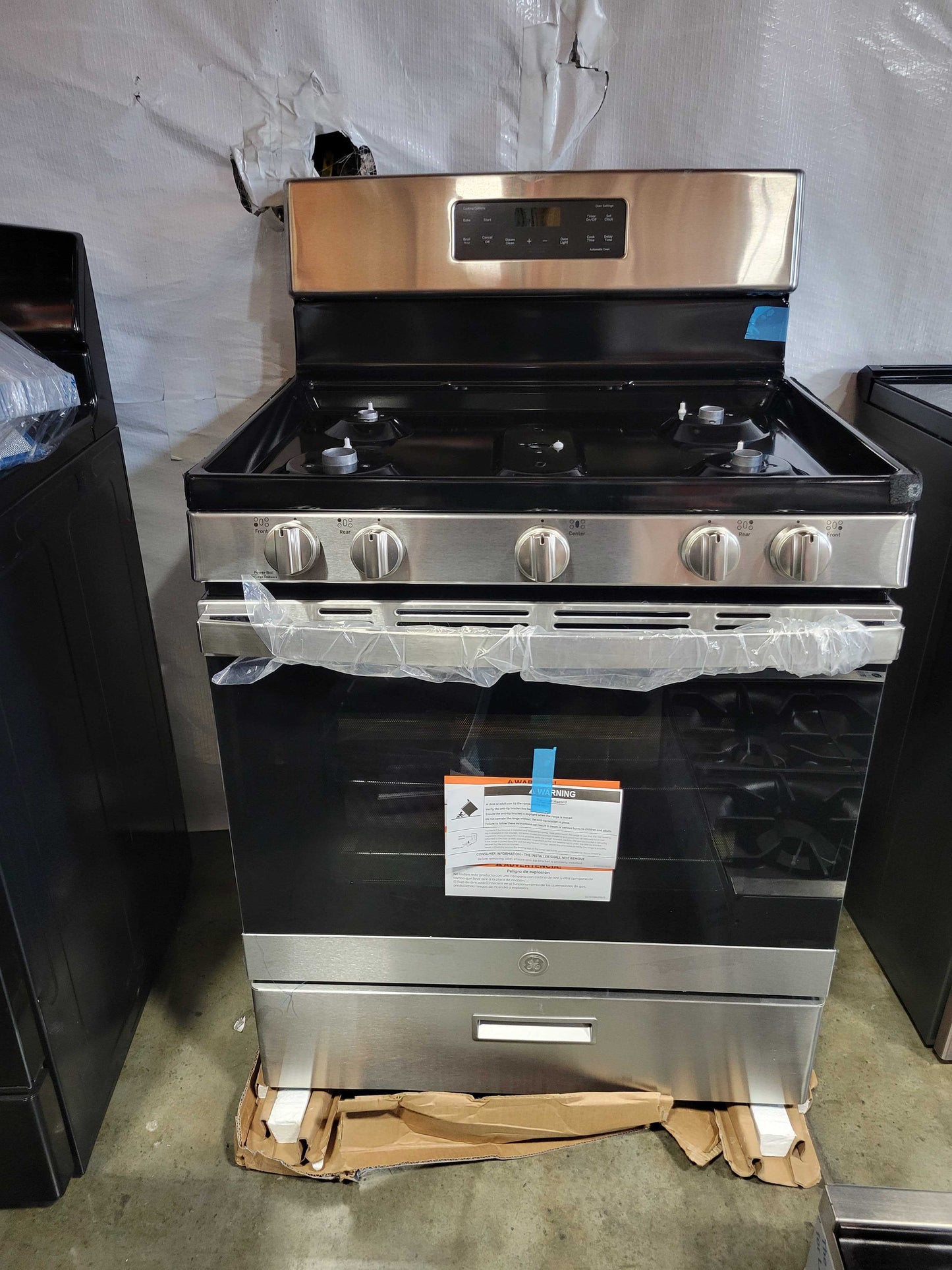 GE 30 in. 5.0 cu. ft. Freestanding Gas Range in Stainless Steel with Griddle 18.7k