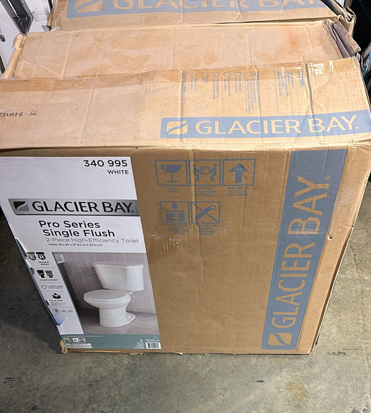 Glacier Bay 12 inch Rough In Two-Piece 1.28 GPF Single Flush Round Toilet in White Seat Included